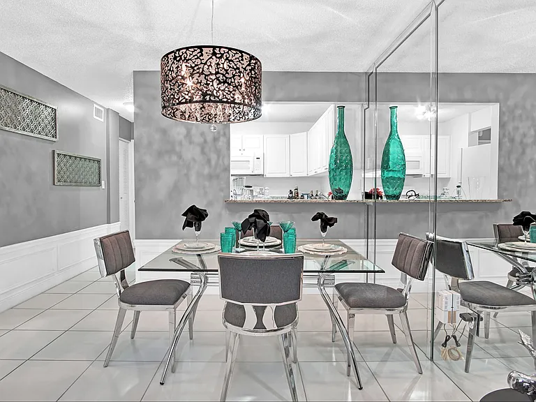 Model Unit 128 - Large Dining Area with Mirrored Walls