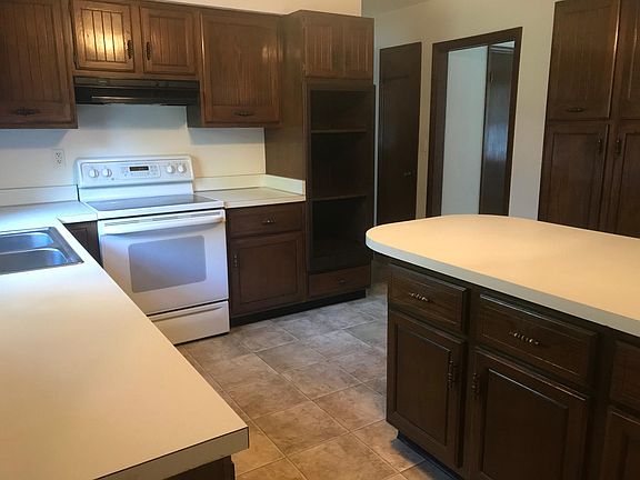 Large kitchen with electric glass top range
