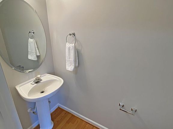 Half Bath near Family Room and Kitchen