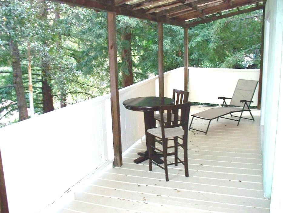 Spacious patio with hill and tree views:)