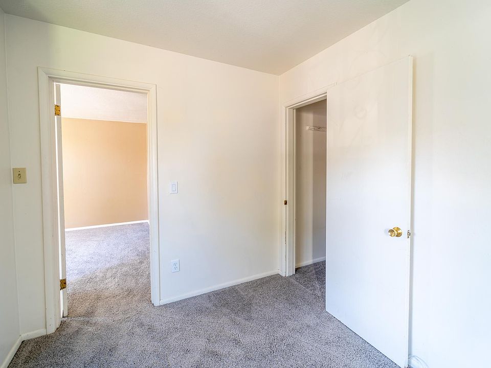 Large bedroom/sitting area with smaller closet