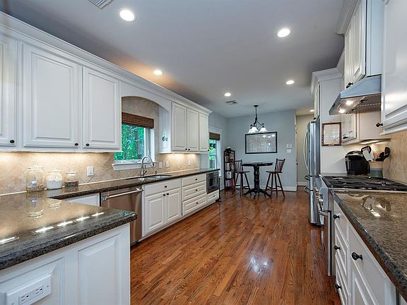 Spacious kitchen with generous counters and cabinets