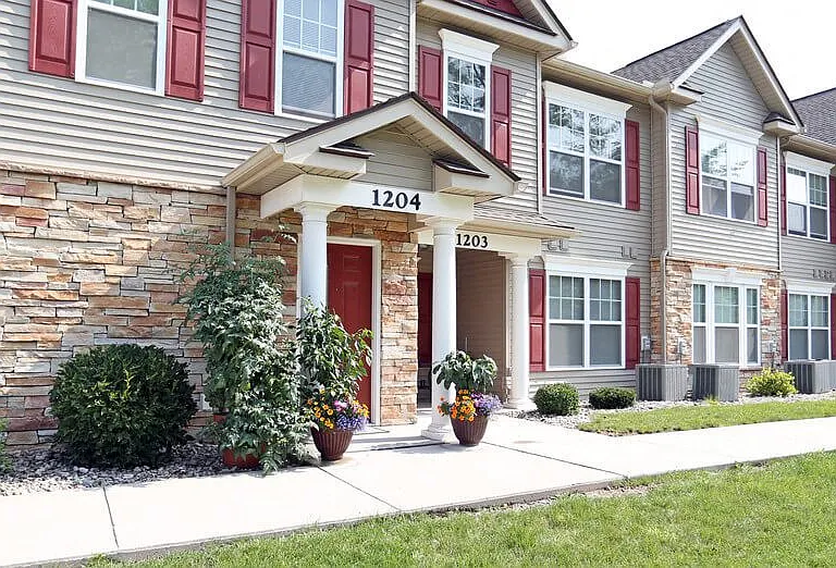 Attractive, covered, private entrance porch for typical apartment