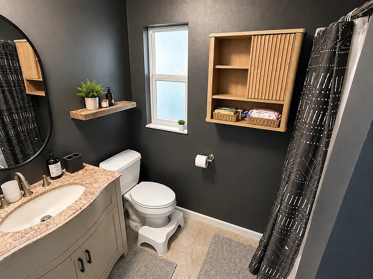 second full bathroom near side/front door entrance of home, shower on right