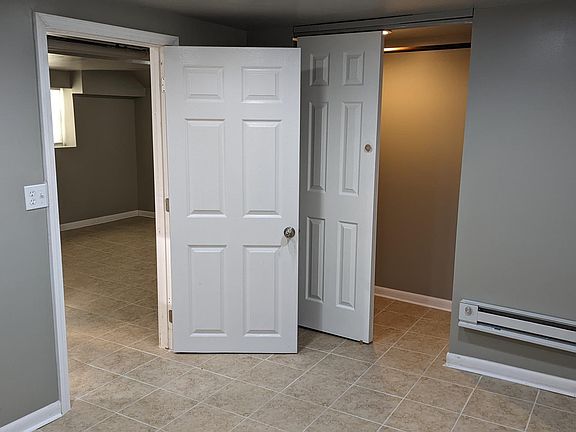 Bedroom closest to entrance (has its own closet)
