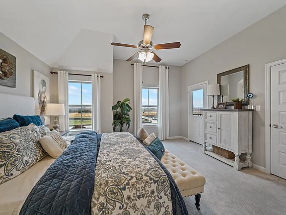 Primary Suite with sloped ceiling