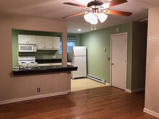 Living room into kitchen view - light bamboo floors!