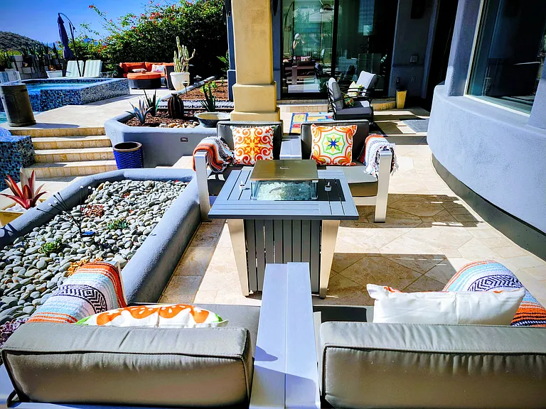 Covered conversation nook with fire table
