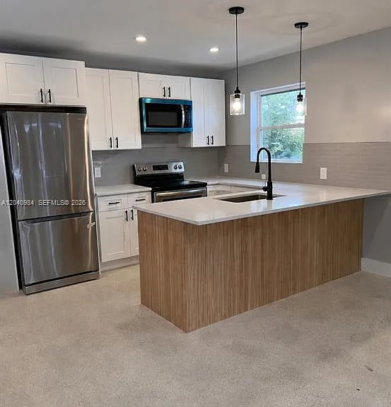 1140 NE 24th Ave #1 — Photo 1
