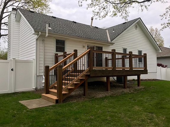 Back Yard with Vinyl Privacy Fence and Composite Deck