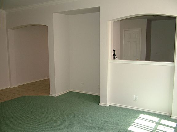 Living opens to kitchen