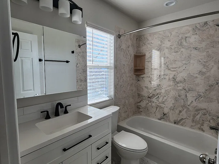 Attached Primary Bathroom w/ new vanity