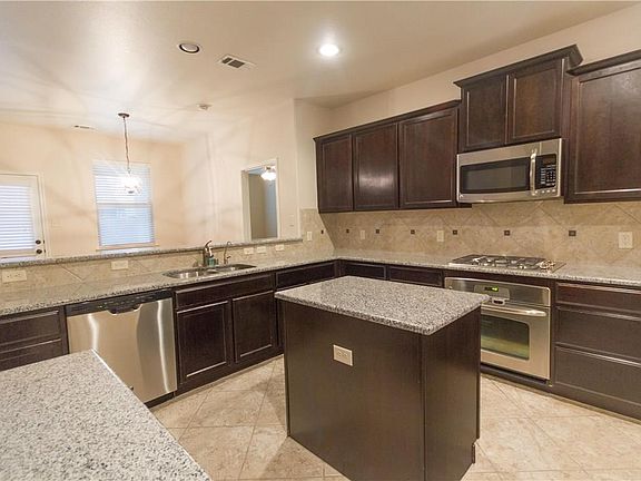 4th image of 405 Riverstone Way