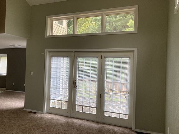 Living room with access to deck