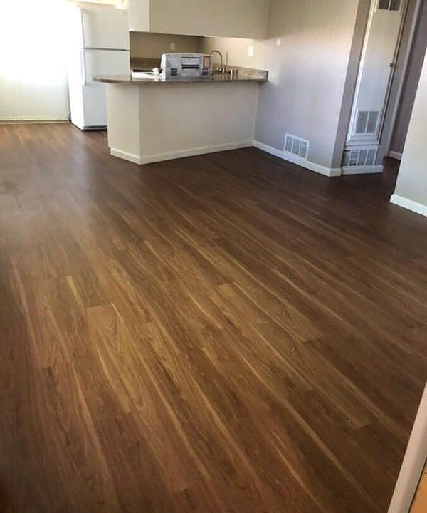 Hardwood floors in front room. Actual beautiful flooring for unit #31. great open space_ 1st floor , 800 sq ft.