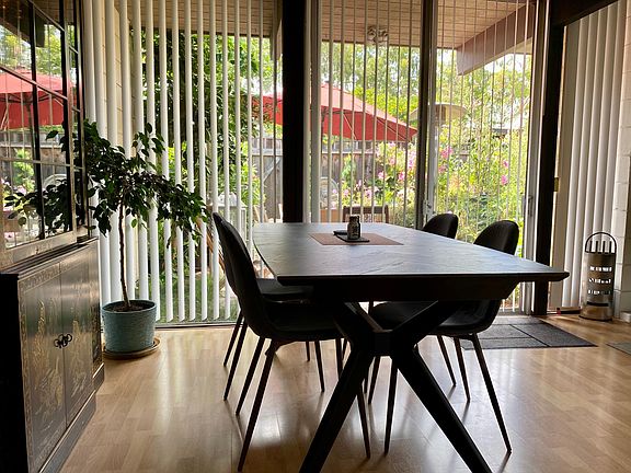 Dining area- connects to living room, looking out onto the backyard