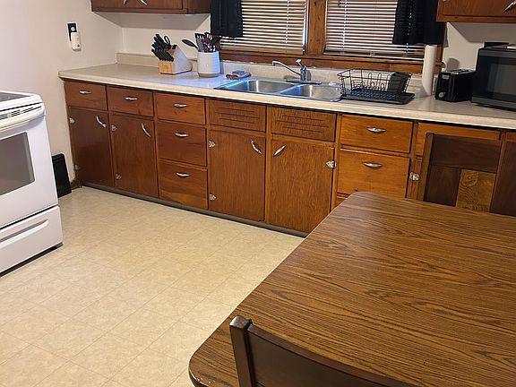 This is the kitchen you will share with the other person staying in the house! It's fully stocked with everything you will need to cook and prepare meals in! (Plates, cups, bowls, pots and pans, silverware etc)