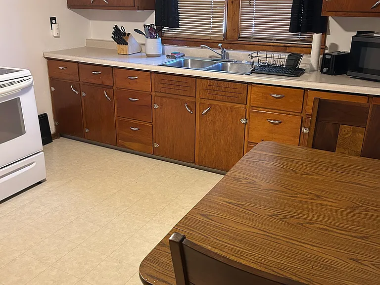 This is the kitchen you will share with the other person staying in the house! It's fully stocked with everything you will need to cook and prepare meals in! (Plates, cups, bowls, pots and pans, silverware etc)