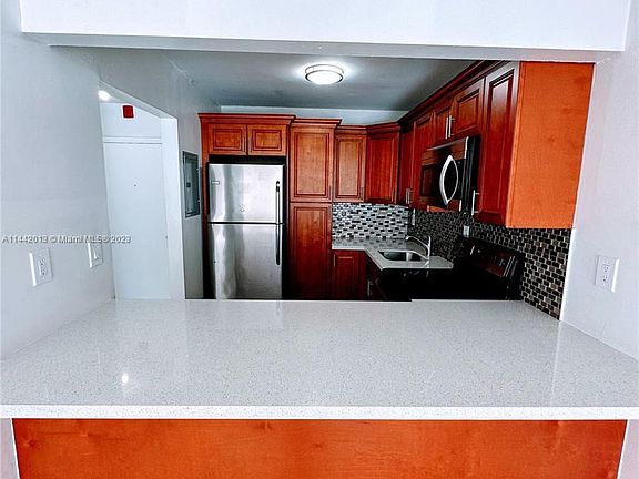 5th image of 6095 W 19th Ave APT 318