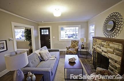 Livingroom
						:
						Solid Wood Floors, Stone Fireplace, Solid Cedar Mantle, LED Lighting