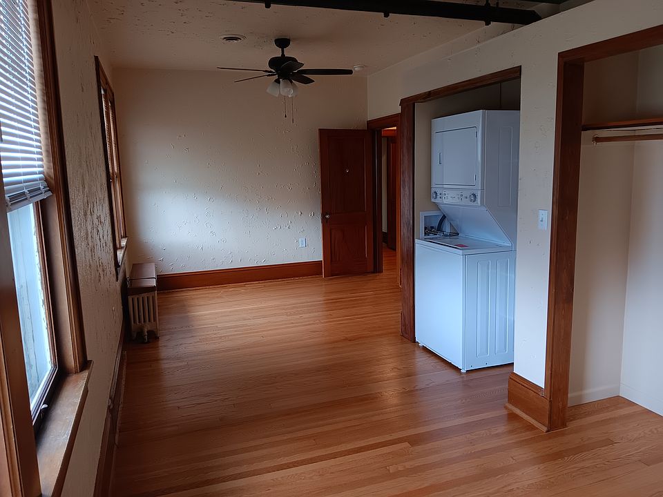 Bedroom 1 with washer/dryer and closet
