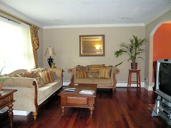 Large Living Room, Brazilian Cherry Hardwood, Wide Crown Moldings
