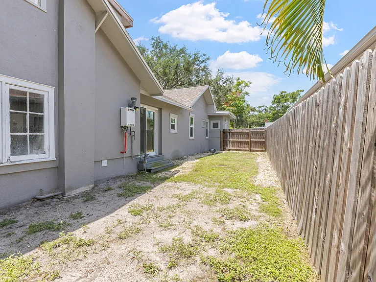 A shared fully fenced backyard offers privacy, security, and space to enjoy the outdoors.
