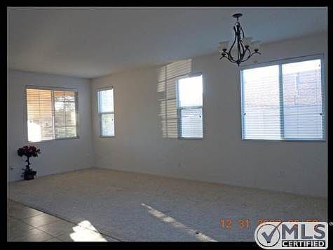 As you enter, on your left, Formal living and dining spaces