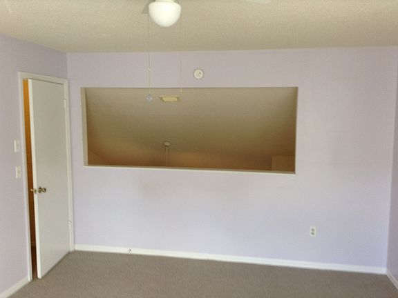 Bedroom opening to living ro