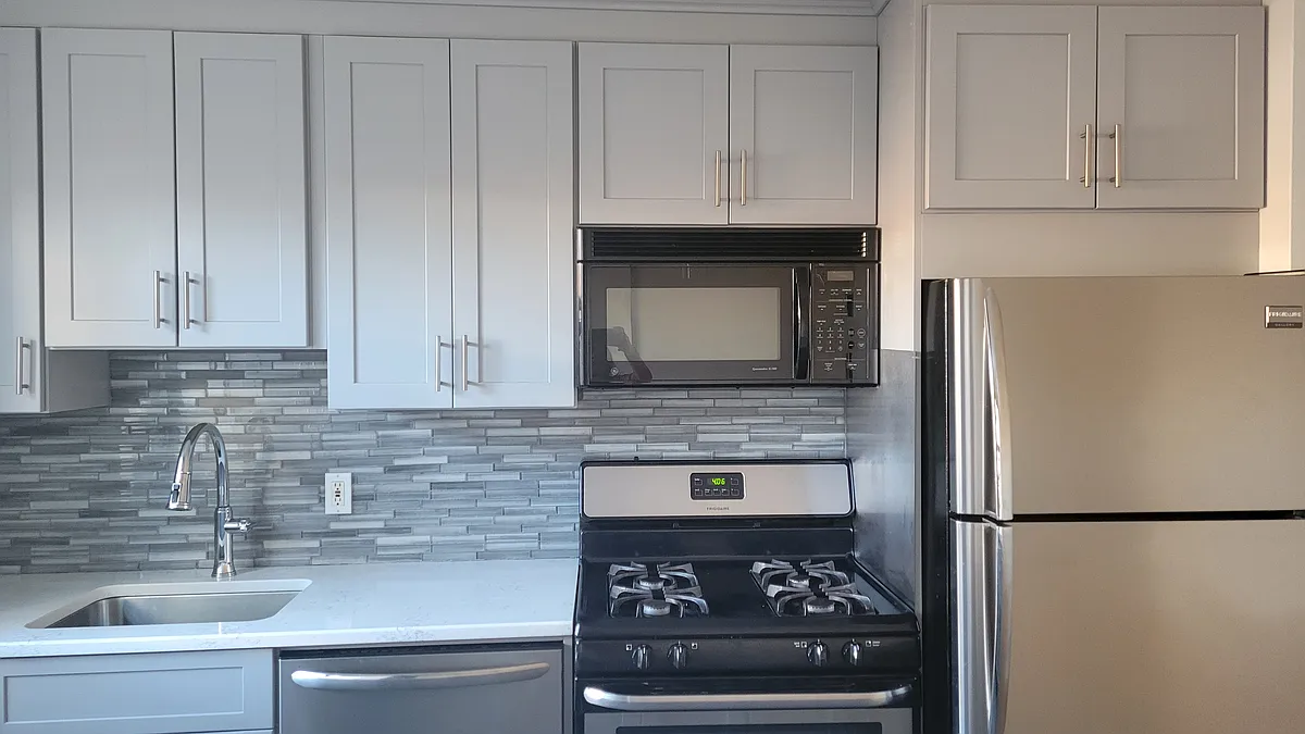 BEAUTIFUL UPDATED KITCHEN WITH QUARTZ COUNTERTOPS - 130 Orient Way #5A