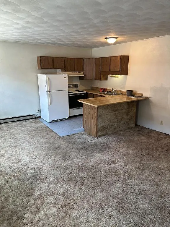 305 W High, 106 S Main, Apt#9 — Photo 1