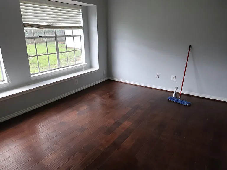Master bedroom has a huge box window looking into the back yard.