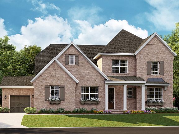 Marin B - English Cottage 3-Car Side Load Garage Note Renderings may show optional features