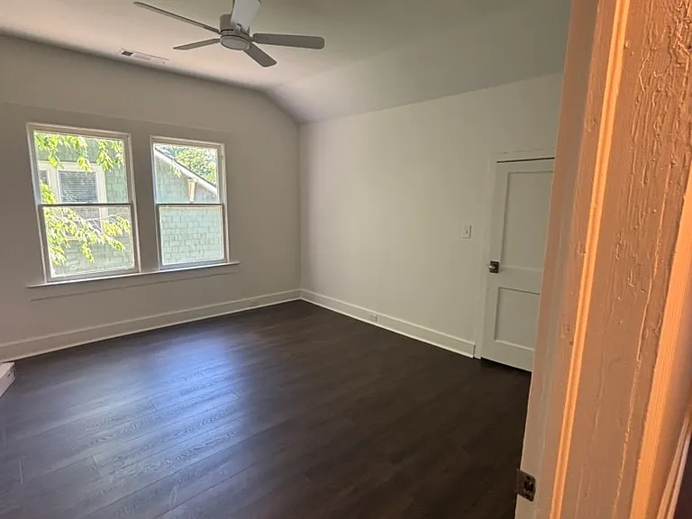 Bedroom 2 - Tall ceilings, remote-controlled fan, walk-in closet.