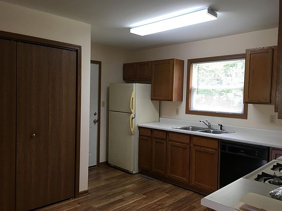 Kitchen updated to SS Fridge and SS Range and Hood, Washer/Dryer Closet on left