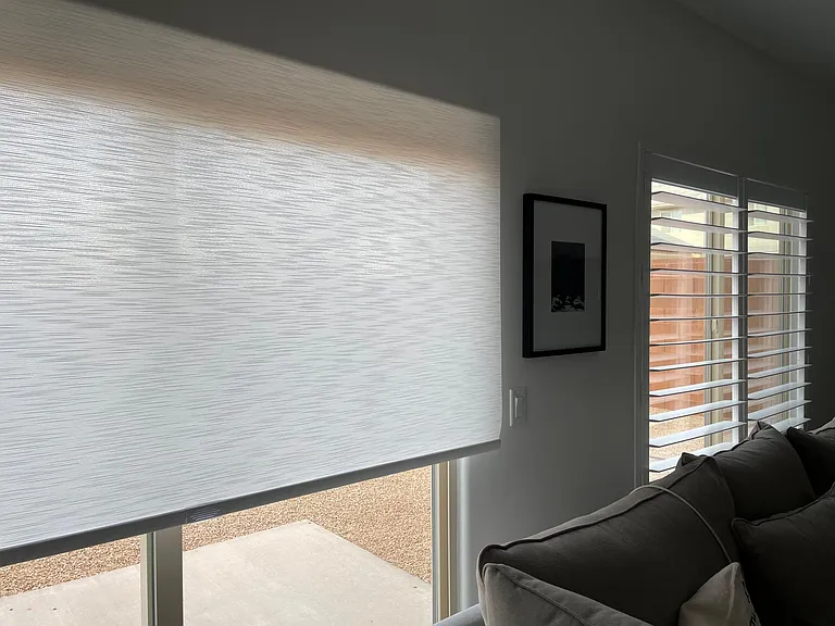 Roller shades and plantation shutters (main floor)
