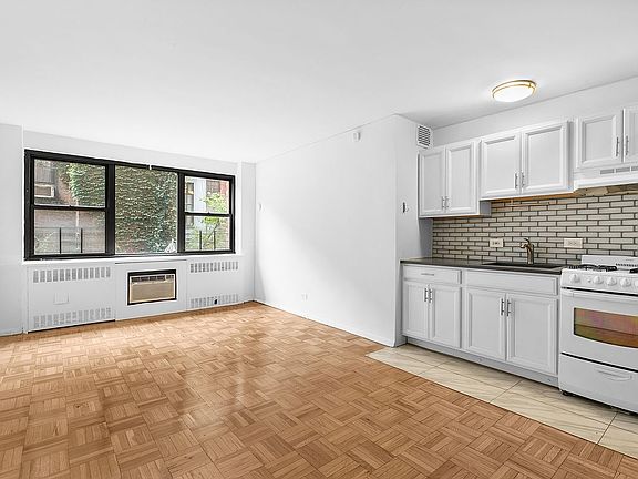 2nd image of 110 E 36th St APT 1E
