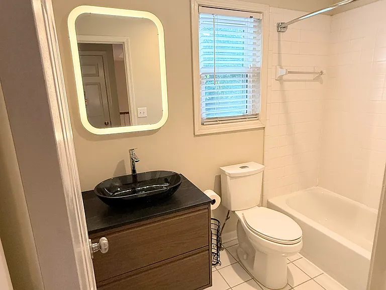 Floating vanity and Hansgrohe faucet