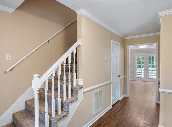 Look to your left and see the stairway to 2nd floor is on your left