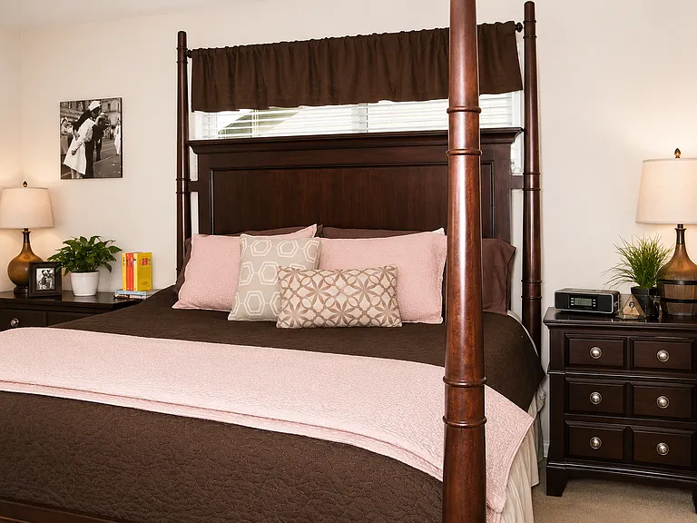 King size bed shown here in main bedroom.