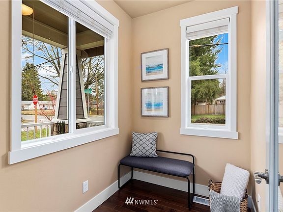 Small flex space off entry would be perfect for a cozy home office.
