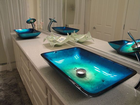 Elegant Glass Sinks in Master