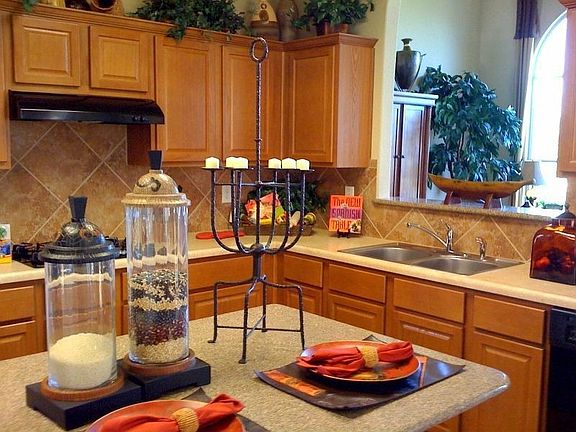 kitchen with island and cherry cabinetry