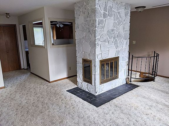 Fireplace & spiral stairway