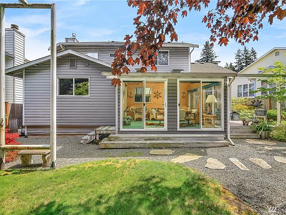 Incredible back yard!  Home offers a Solarium/Sun Room.  It is great.  Lots of natural light + protection from the wind and weat