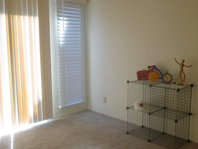 2nd Bedroom with Sliding Door Access to Back Yard.