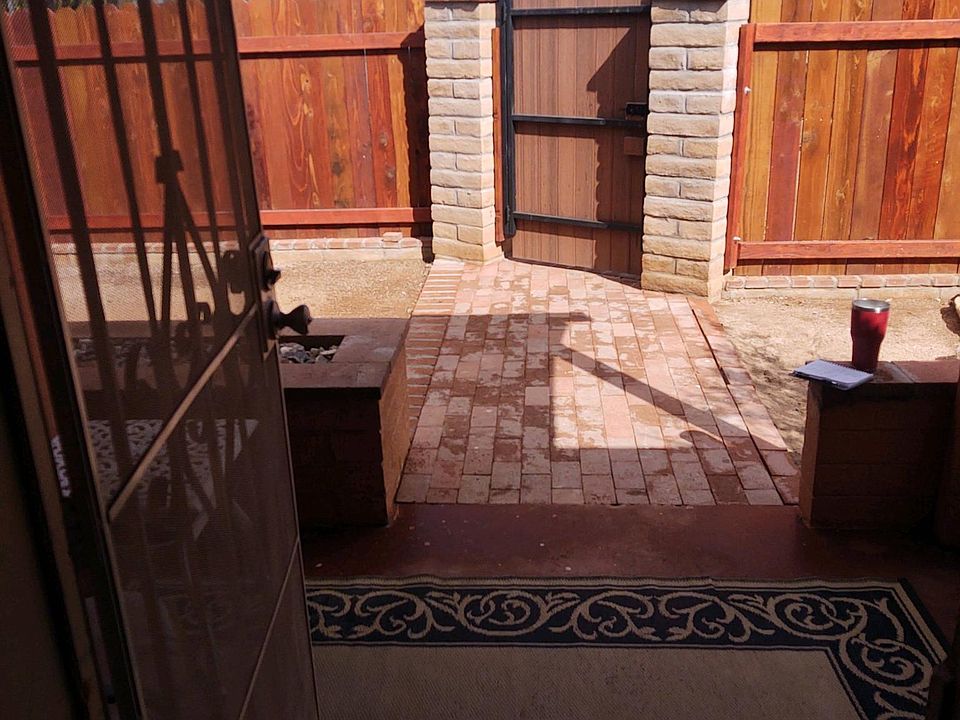 Front door looking at front yard gate.