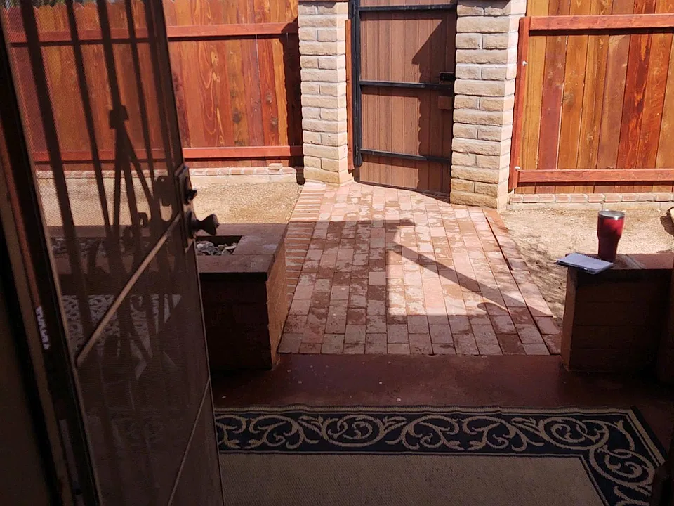Front door looking at front yard gate.