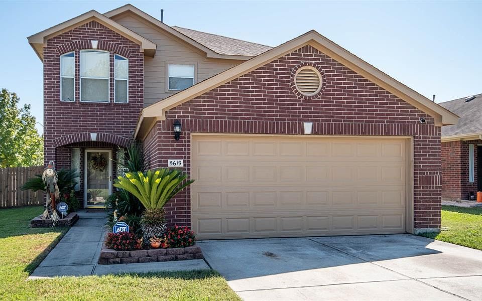 Affordable Home on corner and fresh exterior paint. 4-2.5-2 car garage