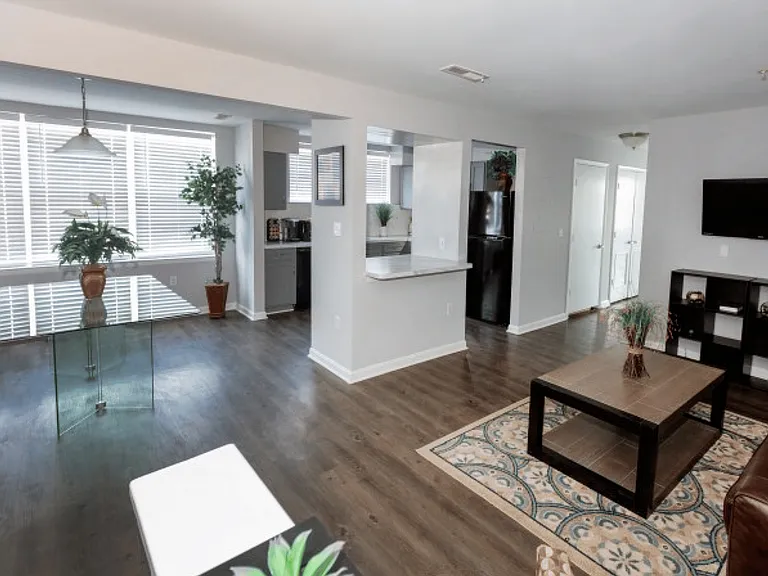 Experience modern elegance in this spacious, sunlit living area, perfect for both relaxation and entertaining.
